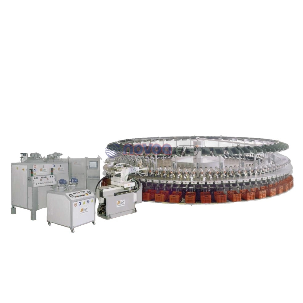 Ama Gusberti PiU 100-S. Máquina rotativa automática de 100 estaciones para la producción de suelas, calzado y artículos técnicos monodensidad.