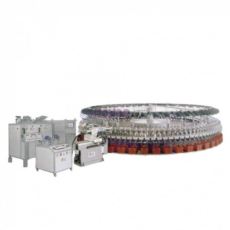 Ama Gusberti PiU 100-S. Máquina rotativa automática de 100 estaciones para la producción de suelas, calzado y artículos técnicos monodensidad.