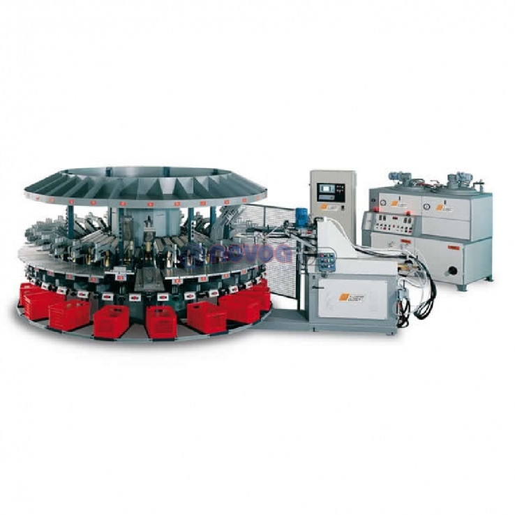 Ama Gusberti PiU 411-S. Máquina rotativa automática de 40 estaciones para moldeo de suelas unitarias y artículos técnicos.